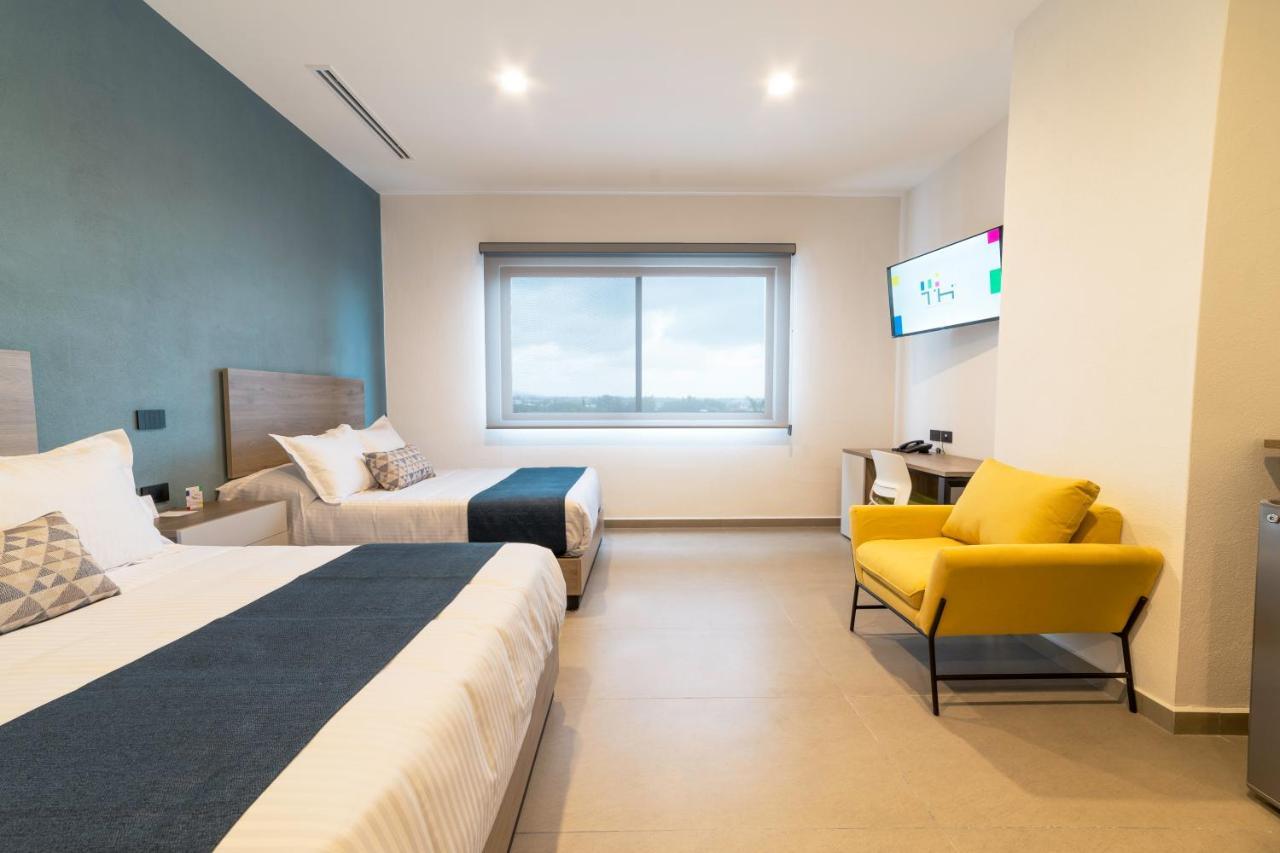 Th Hotel & Vivienda تيباتيتلان دي موريلوس المظهر الخارجي الصورة