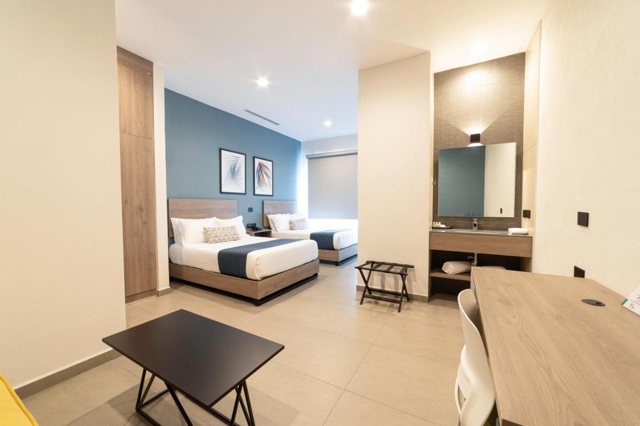 Th Hotel & Vivienda تيباتيتلان دي موريلوس المظهر الخارجي الصورة
