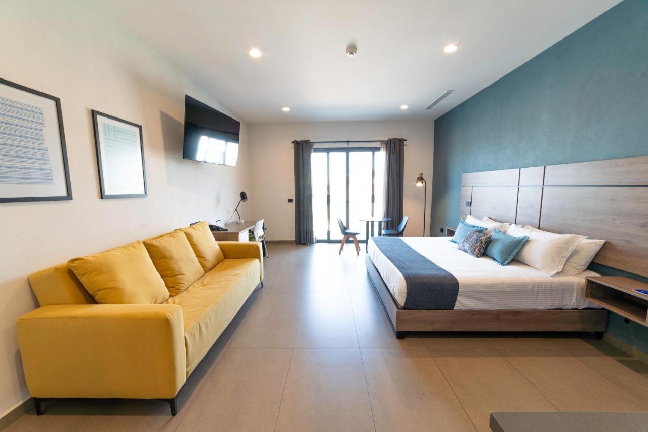Th Hotel & Vivienda تيباتيتلان دي موريلوس المظهر الخارجي الصورة