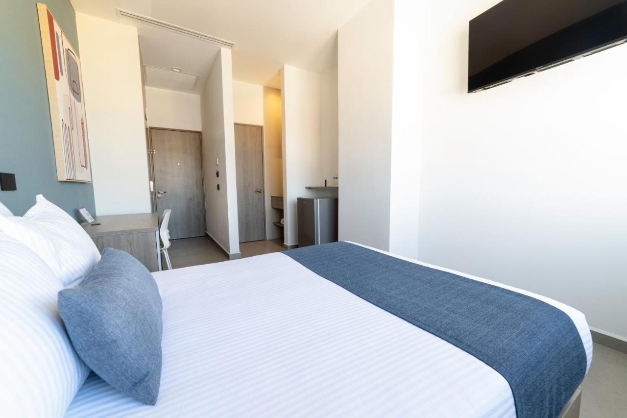 Th Hotel & Vivienda تيباتيتلان دي موريلوس المظهر الخارجي الصورة
