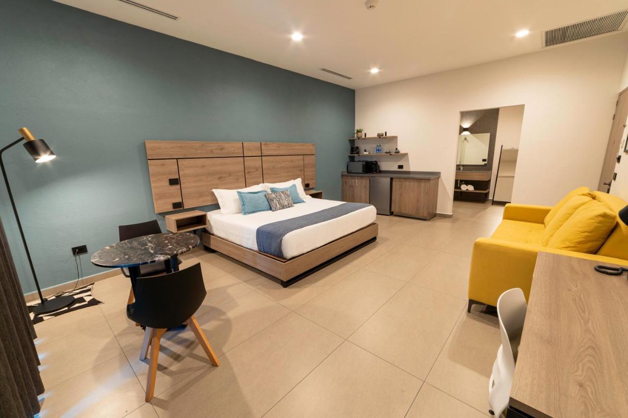 Th Hotel & Vivienda تيباتيتلان دي موريلوس المظهر الخارجي الصورة