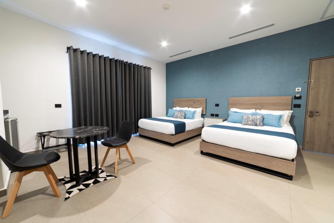 Th Hotel & Vivienda تيباتيتلان دي موريلوس المظهر الخارجي الصورة