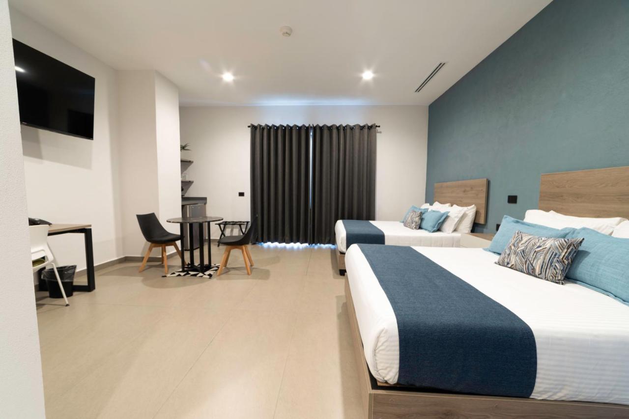 Th Hotel & Vivienda تيباتيتلان دي موريلوس المظهر الخارجي الصورة