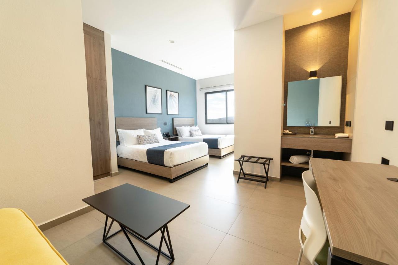 Th Hotel & Vivienda تيباتيتلان دي موريلوس المظهر الخارجي الصورة