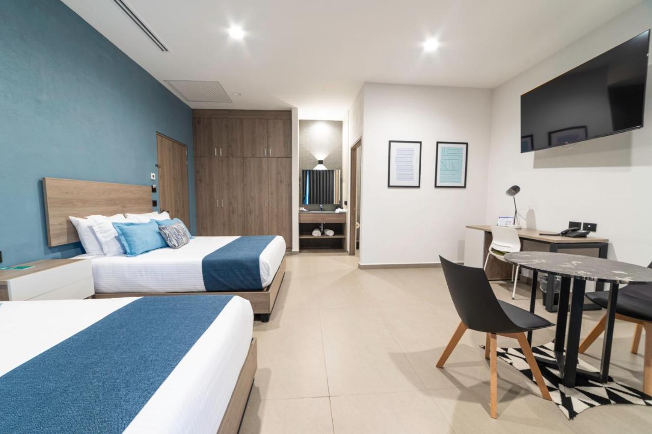 Th Hotel & Vivienda تيباتيتلان دي موريلوس المظهر الخارجي الصورة