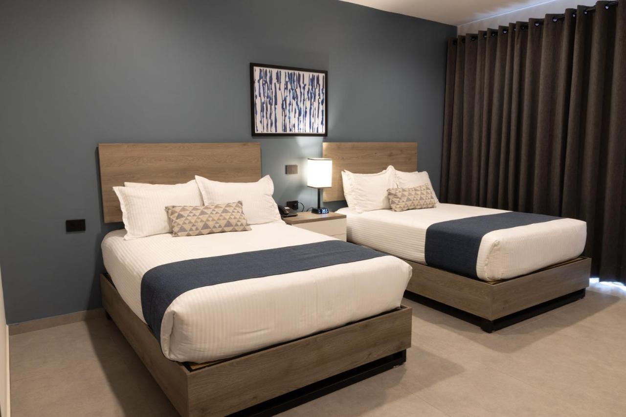 Th Hotel & Vivienda تيباتيتلان دي موريلوس المظهر الخارجي الصورة