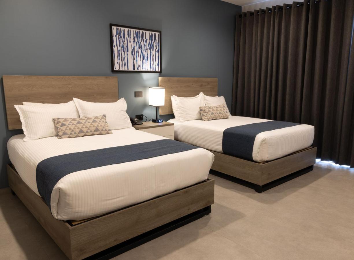 Th Hotel & Vivienda تيباتيتلان دي موريلوس المظهر الخارجي الصورة