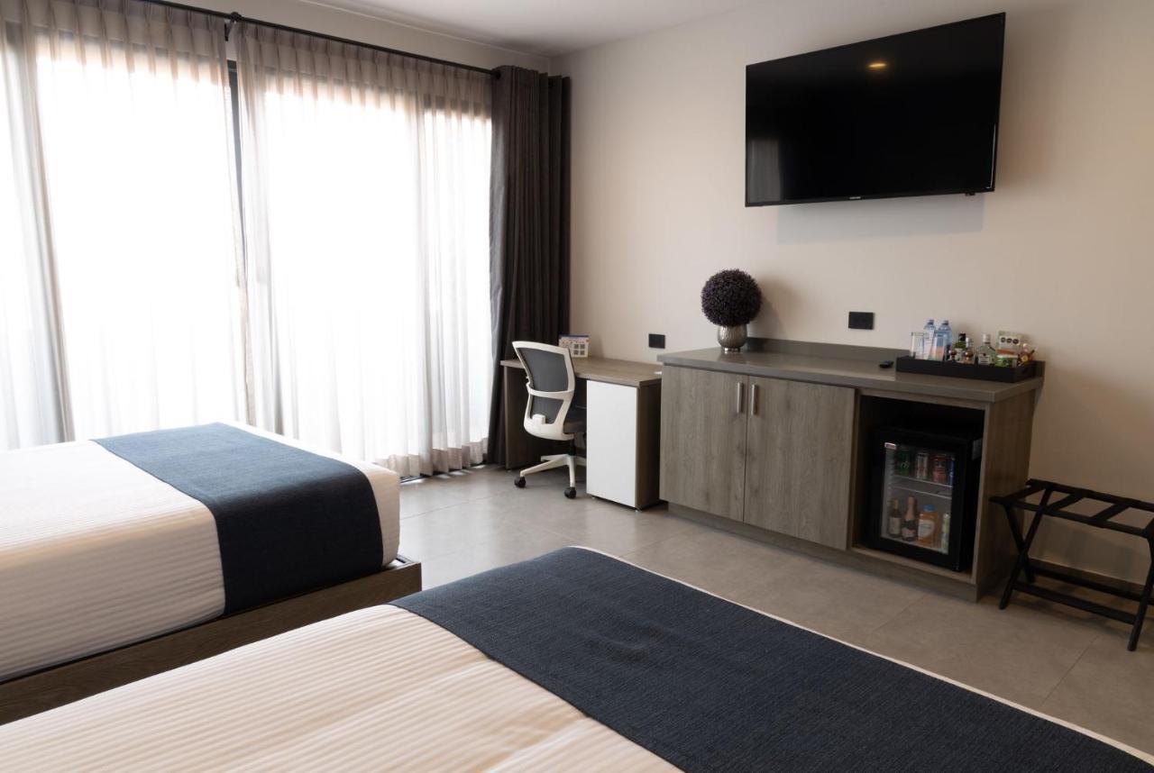 Th Hotel & Vivienda تيباتيتلان دي موريلوس المظهر الخارجي الصورة
