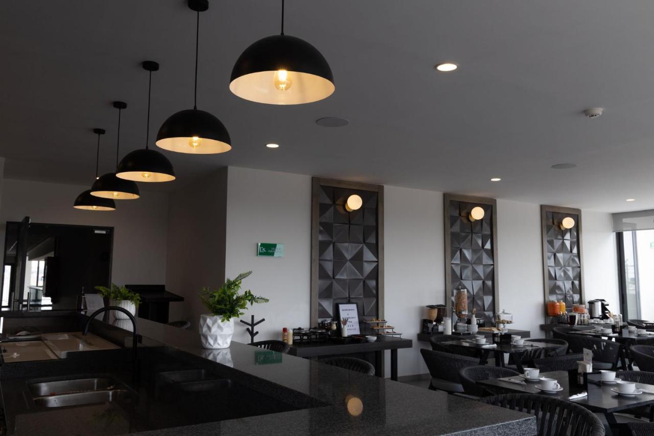 Th Hotel & Vivienda تيباتيتلان دي موريلوس المظهر الخارجي الصورة