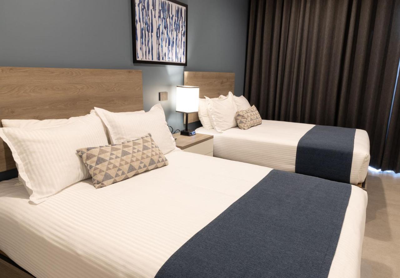 Th Hotel & Vivienda تيباتيتلان دي موريلوس المظهر الخارجي الصورة